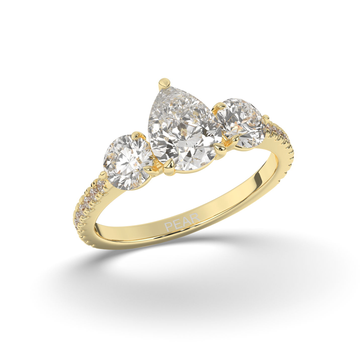 Three Stone Solitaire Ring Pear